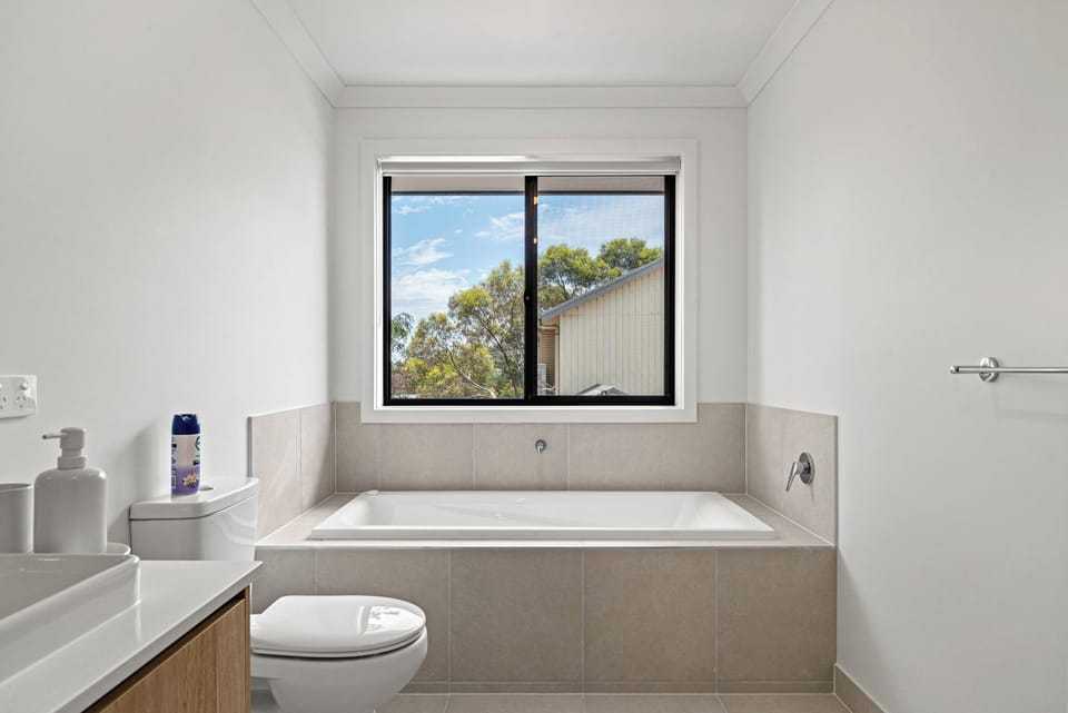 Main bathroom with shower and toilet