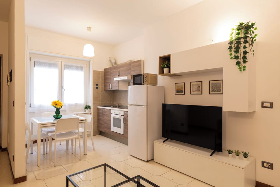 Comfort Apartment | Living area | 50-inch Smart TV with digital channels