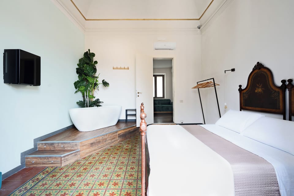 Quadruple Room, City View (Proserpina) | Blackout drapes, soundproofing, iron/ironing board, free WiFi