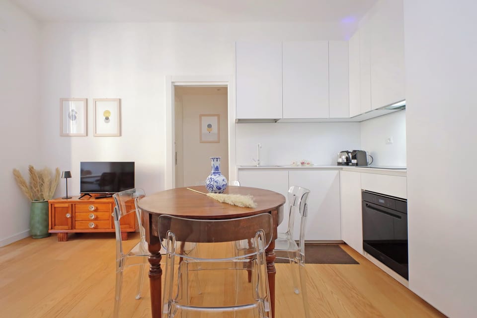 Apartment | Living area | 36-inch flat-screen TV with cable channels