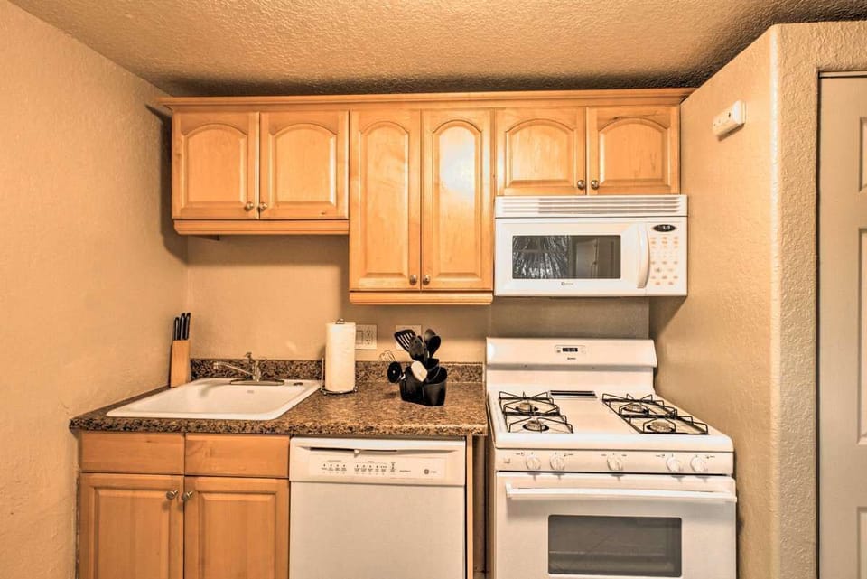 A sleek kitchen fully equipped with everything you need to whip up delicious meals.