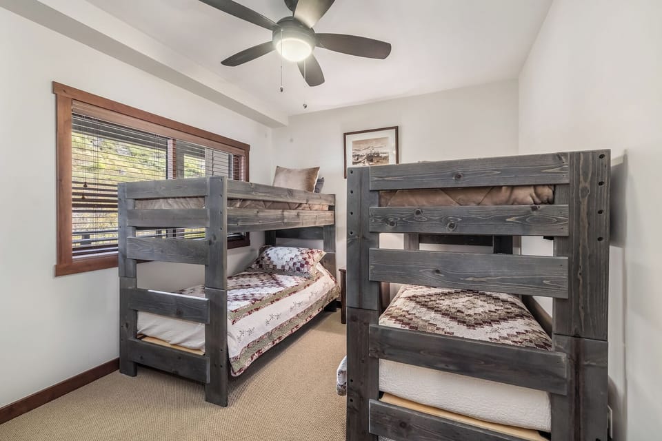 2 sets of twin bunkbeds that are great for kids or a group getaway