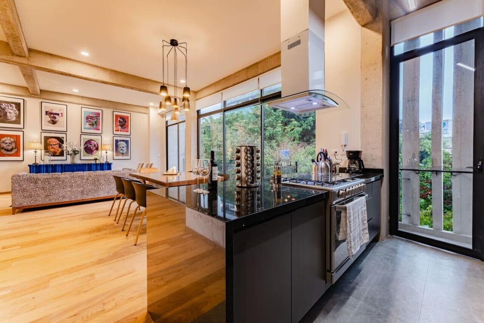 Open kitchen and dining area with plenty of space for group meals and gatherings.