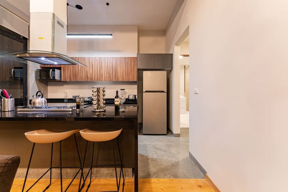 Cozy breakfast bar in the kitchen, ideal for casual meals or morning coffee.