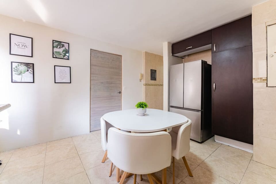 Perfect spot for a quick meal or coffee break in the heart of the home.