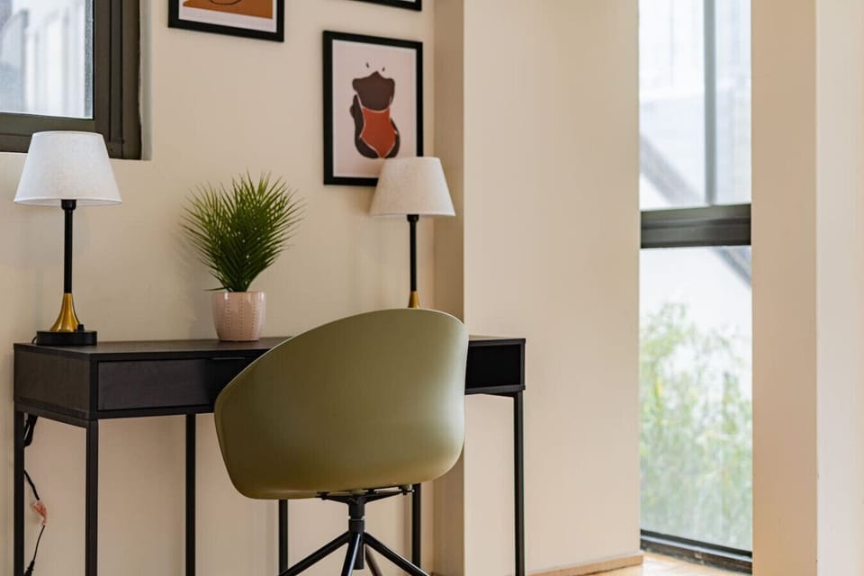 A cozy corner to work or relax, with a bright view and stylish details.