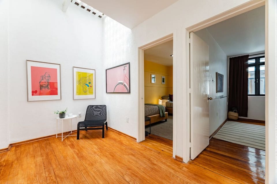 Entryway with view into bedrooms