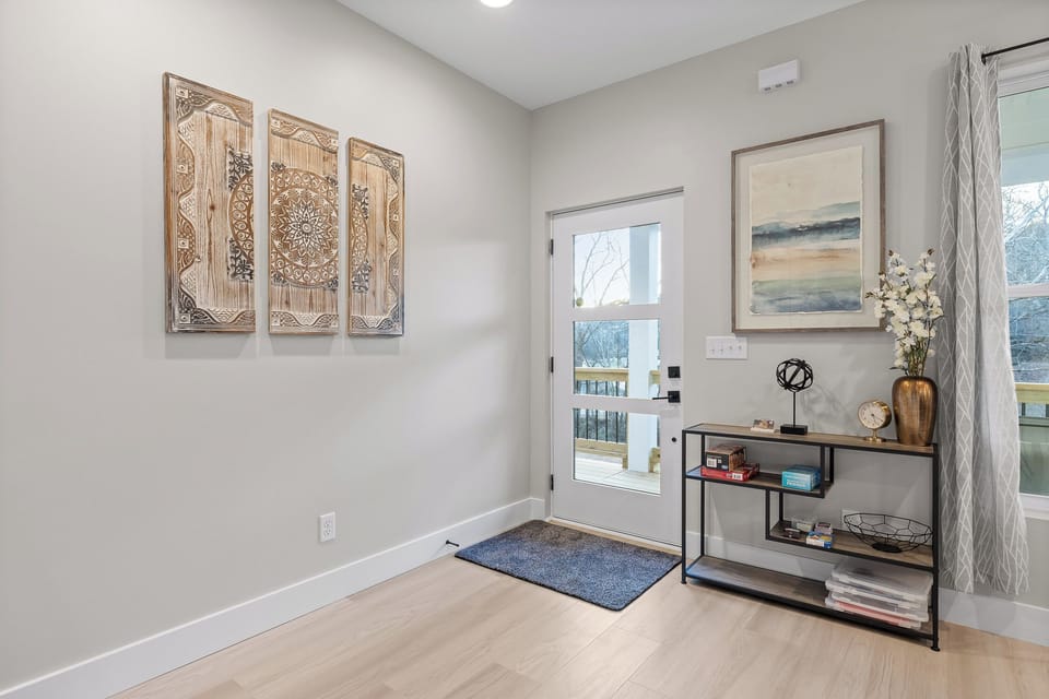 Open Concept Living Room with 65" 4K Flat Screen (3)