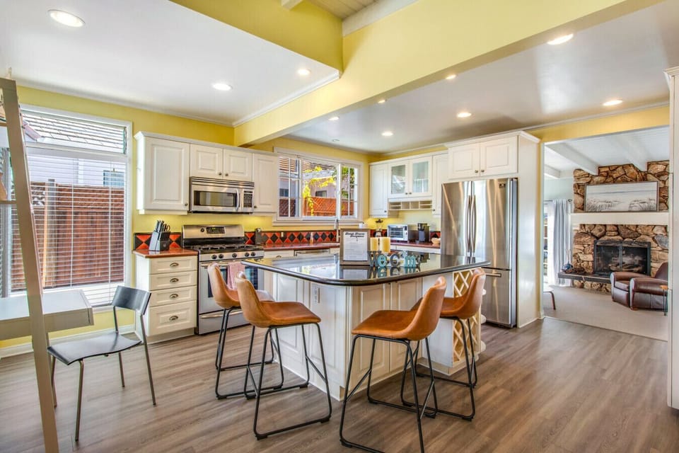 fully-equipped kitchen, complete with a spacious island and seating for four.