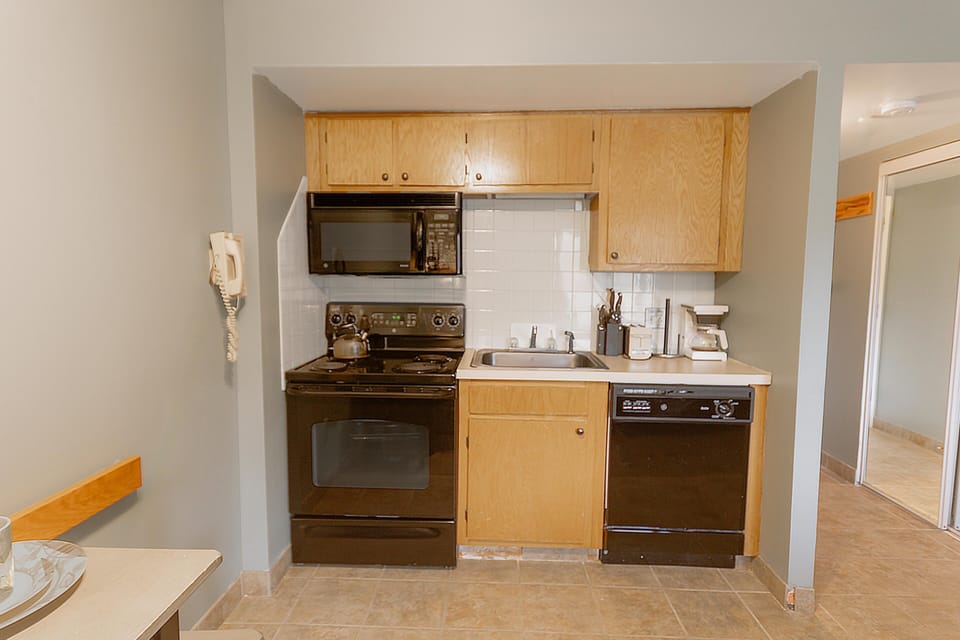 Whip up meals, snacks, or your morning coffee in the fully equipped kitchen.