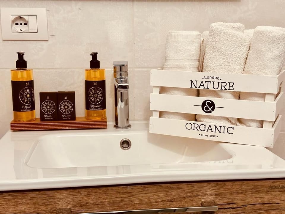 Shower, free toiletries, hair dryer, slippers