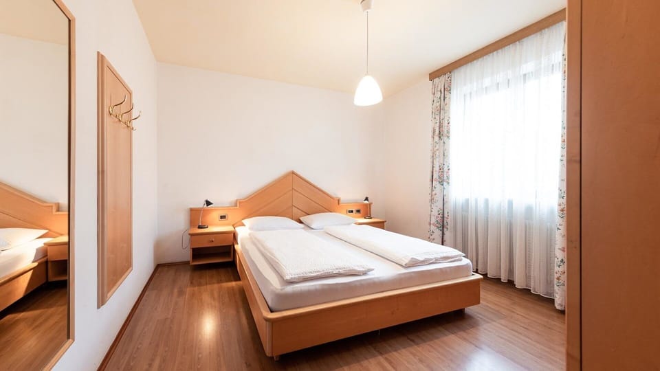 Bedroom with beds made up