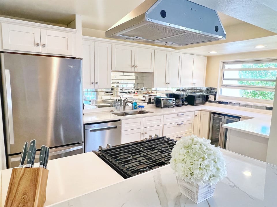 Cook, snack, or mix up a drink in this stylish and functional kitchen.