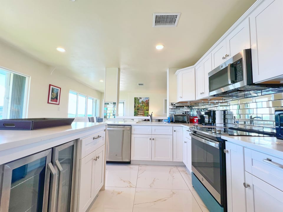 A fully equipped kitchen with modern appliances makes cooking (or reheating leftovers) easy.