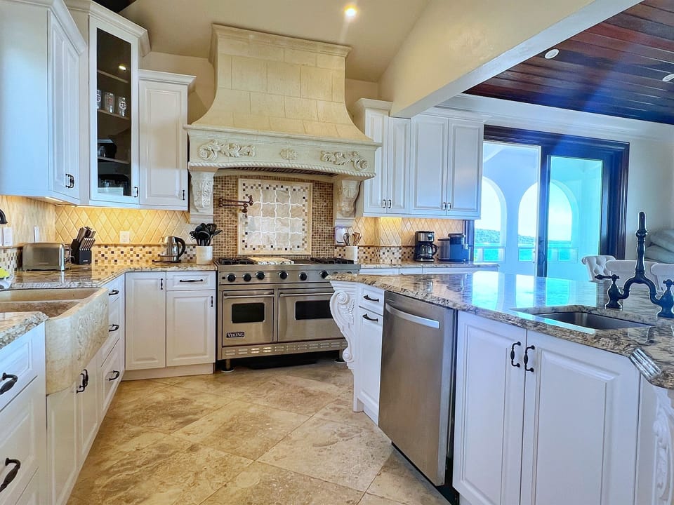 Cook with ease in a modern kitchen equipped for gourmet meals.