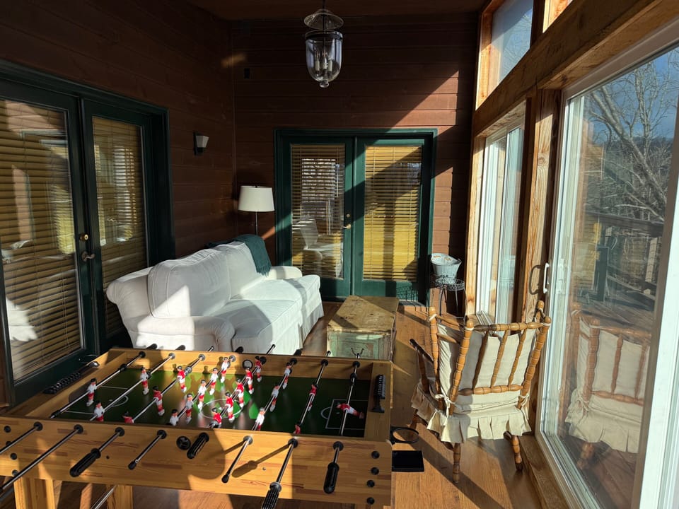 Unheated Sunroom with Foosball Table