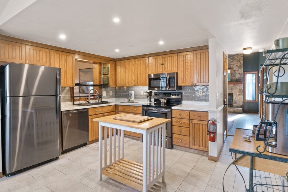 Kitchen with Butcher Block Top Island, Updated Appliances, and Coffee Bar