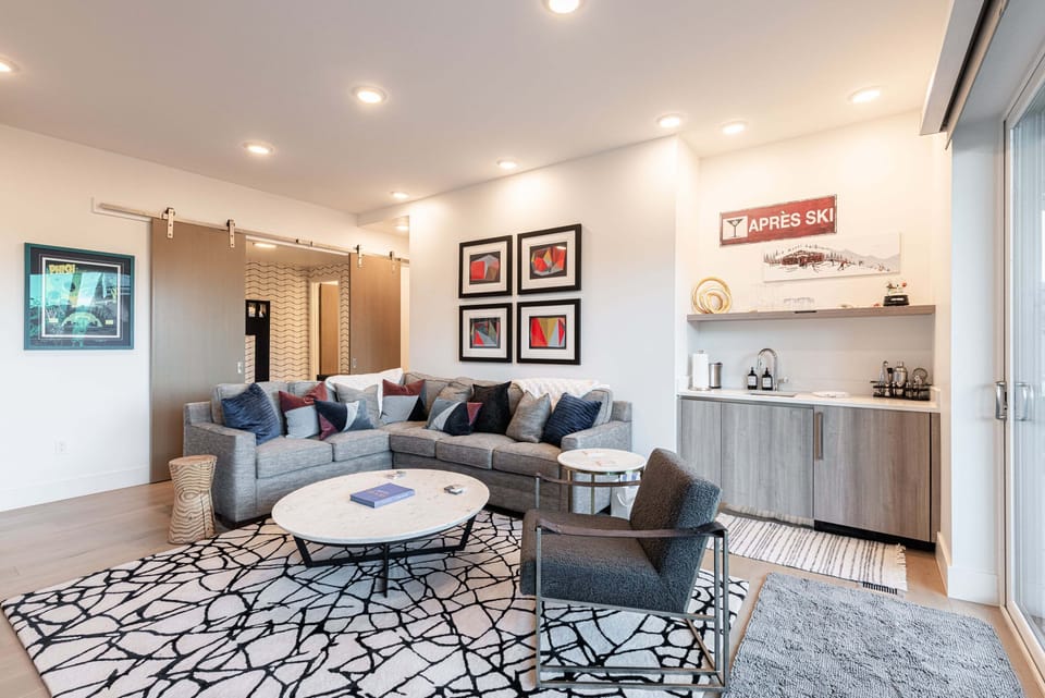Lower-level family room with sectional seating
