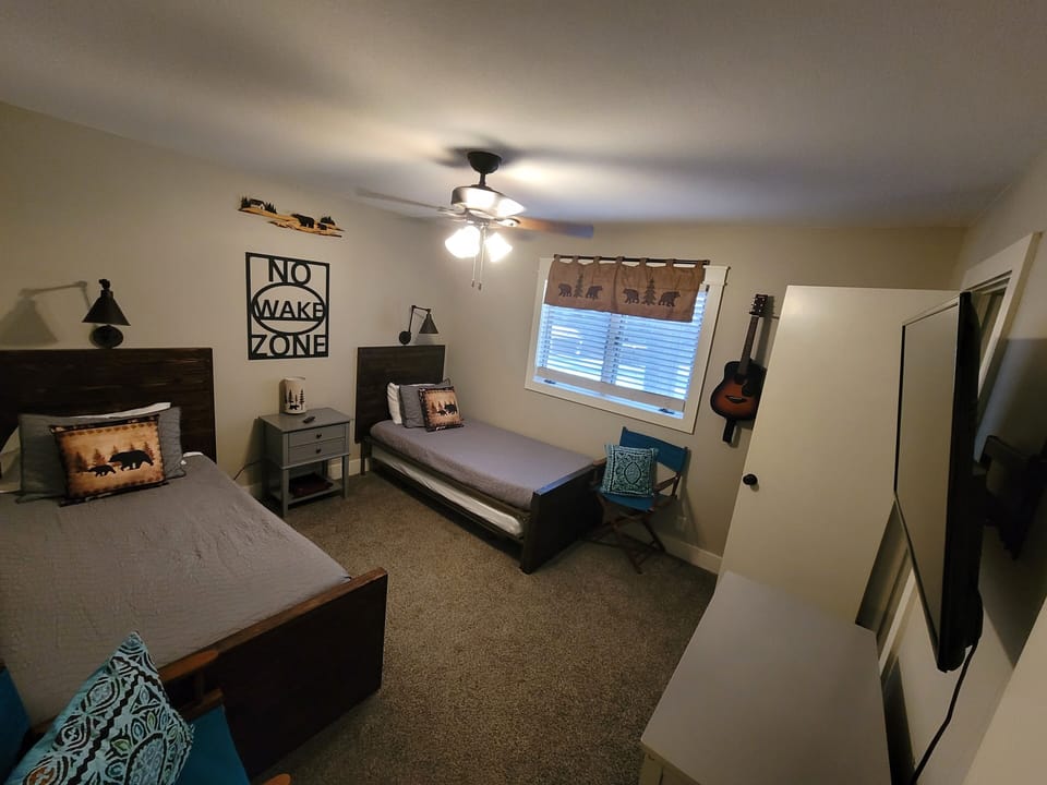 second bedroom, 2 trundle beds,closet has a Pack n Play,high chair & toddler bed