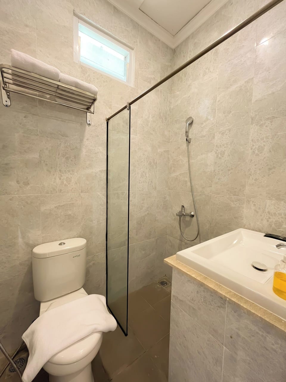 Shower, slippers, bidet, towels