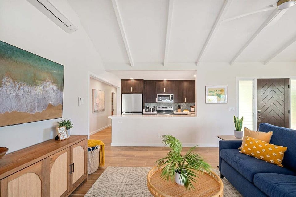 Relax in a stylish lounge featuring a cozy sofa and open-concept design.