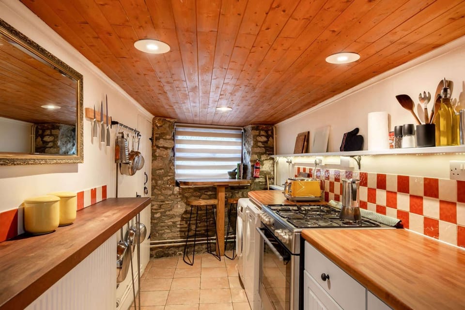 Please note, the kitchen has a low ceiling.