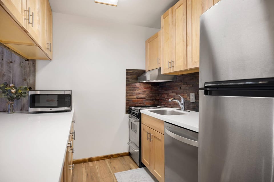 The kitchen is fully stocked and features new appliances.  Preparing meals at home will be a breeze!