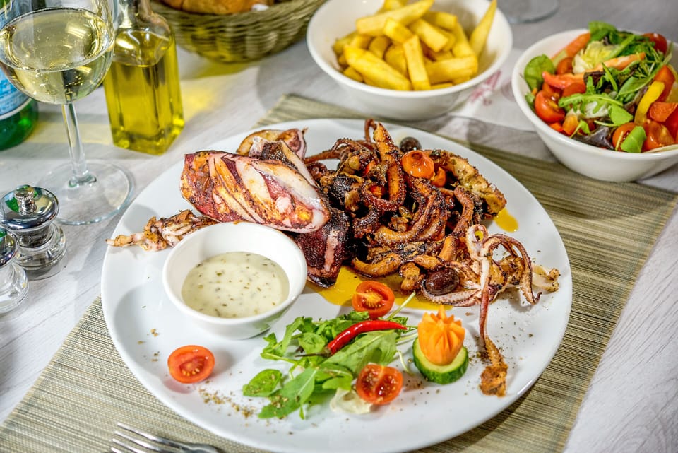 Lunch or dinner? Amazing fresh food in Xlendi Bay! Restaurants are open all year
