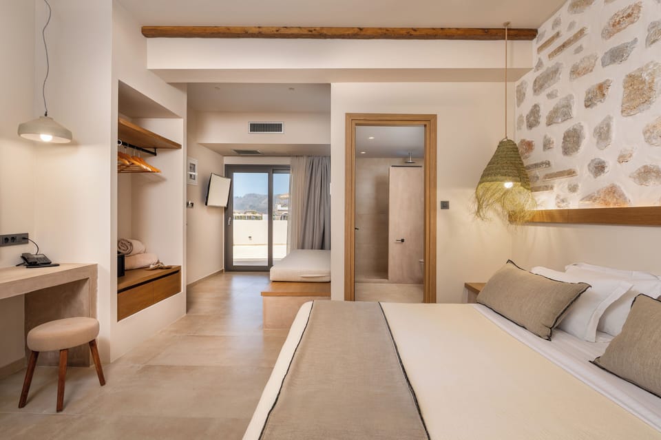 Deluxe Double Room, Partial Sea View | Blackout drapes, iron/ironing board (on request), WiFi (free)