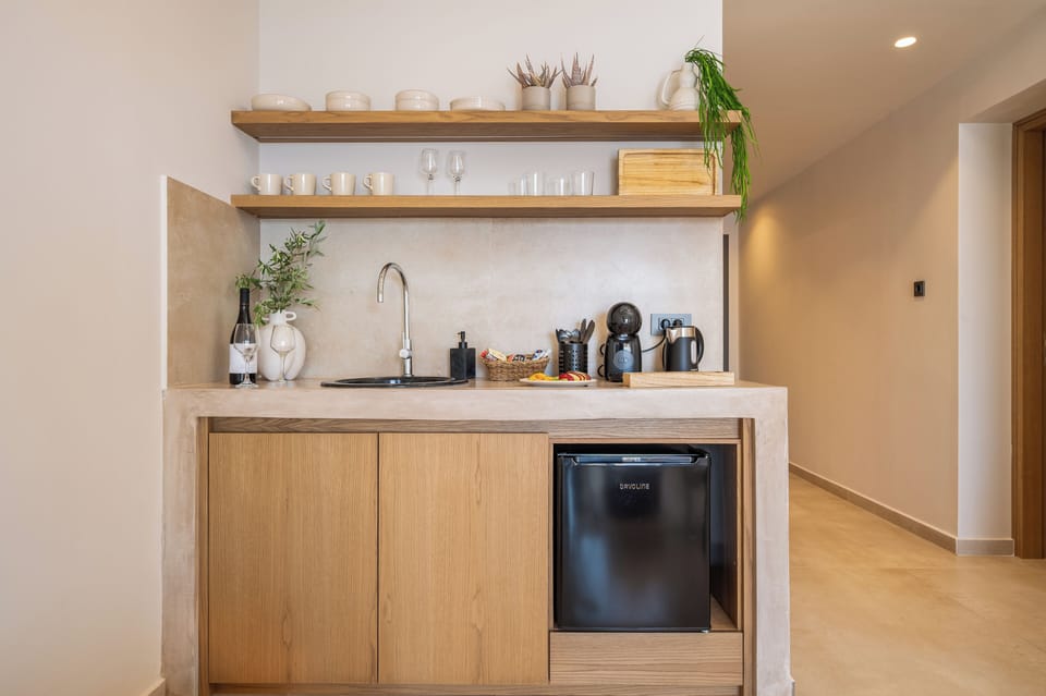 Superior Studio Suite, 2 Bedrooms | Living area | TV