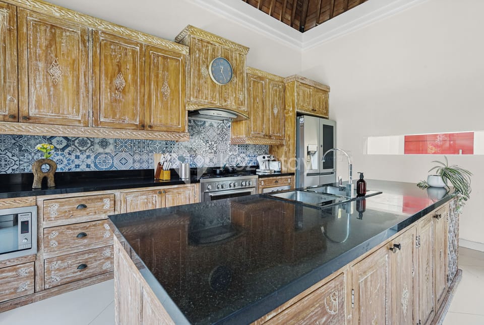 Villa, 4 Bedrooms, Private Pool | Private kitchen | Rice cooker, cleaning supplies, freezer
