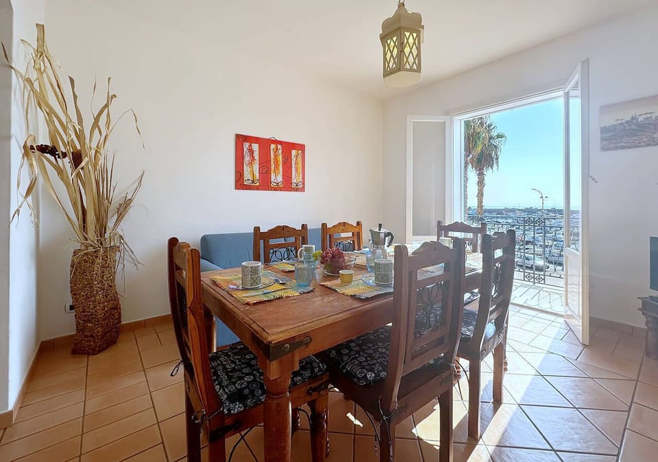 Apartment, Balcony, Sea View | Living area | 24-inch flat-screen TV with cable channels