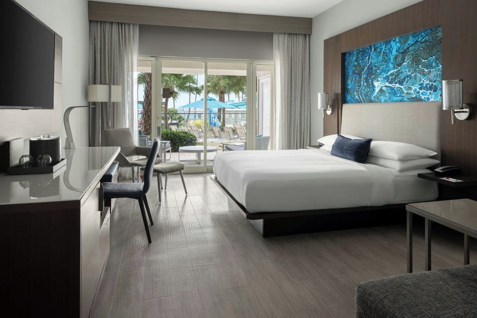 Room, 1 King Bed, Pool View (Pool Access) | Premium bedding, in-room safe, desk, blackout drapes