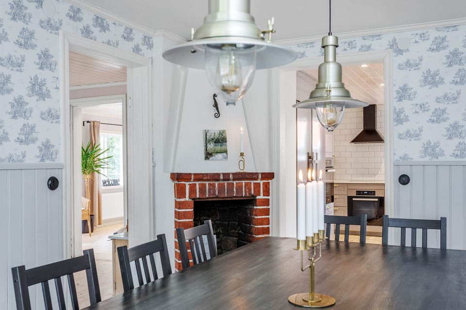 Large dining table and fireplace