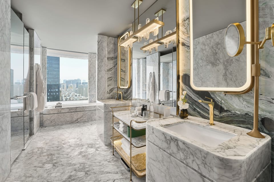 Separate tub and shower, rainfall showerhead, designer toiletries