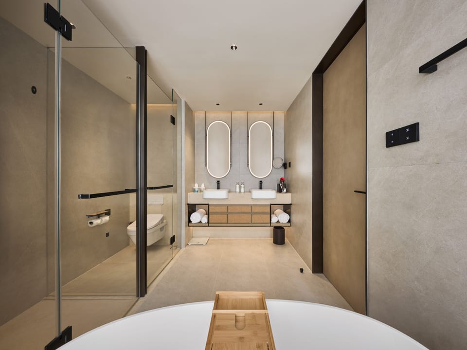 Deluxe Suite, 2 Bedrooms, Club Lounge Access, City View | Bathroom | Designer toiletries, hair dryer, bathrobes, slippers