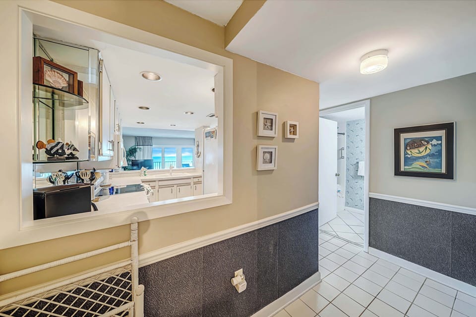 There is an additional full bathroom located off the hall.