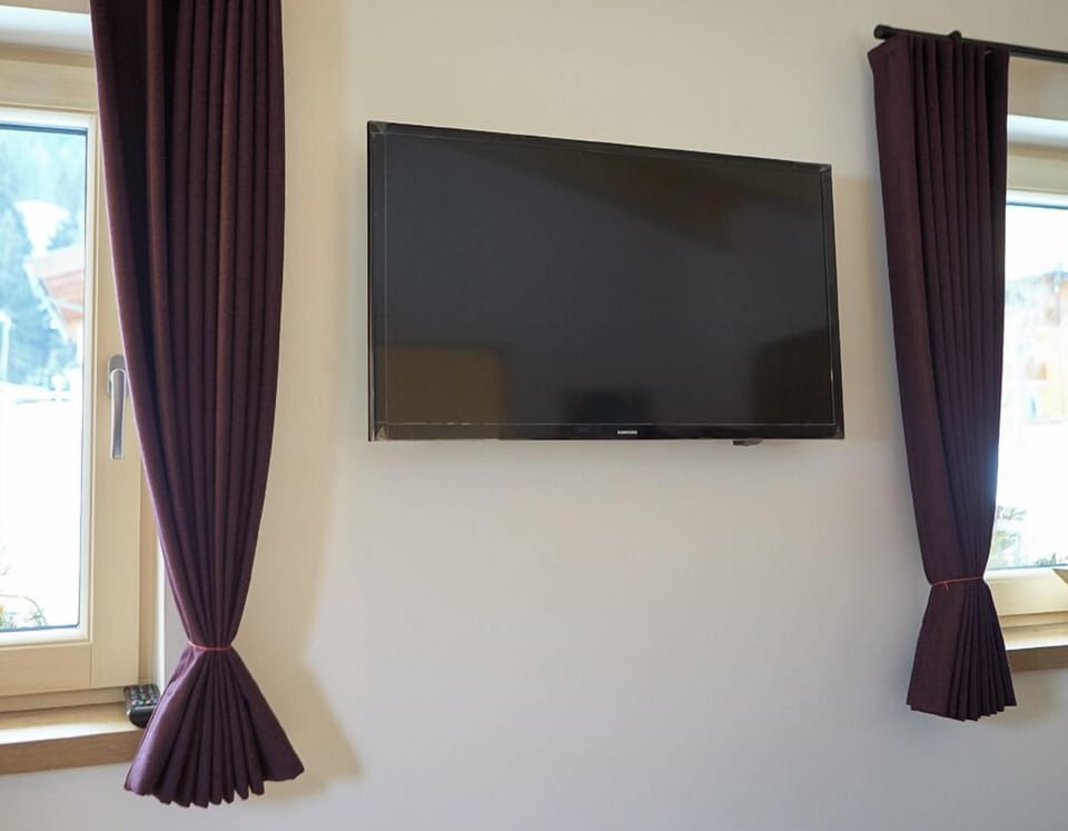Classic Apartment, Non Smoking, Mountain View | Living area | 50-inch flat-screen TV with cable channels
