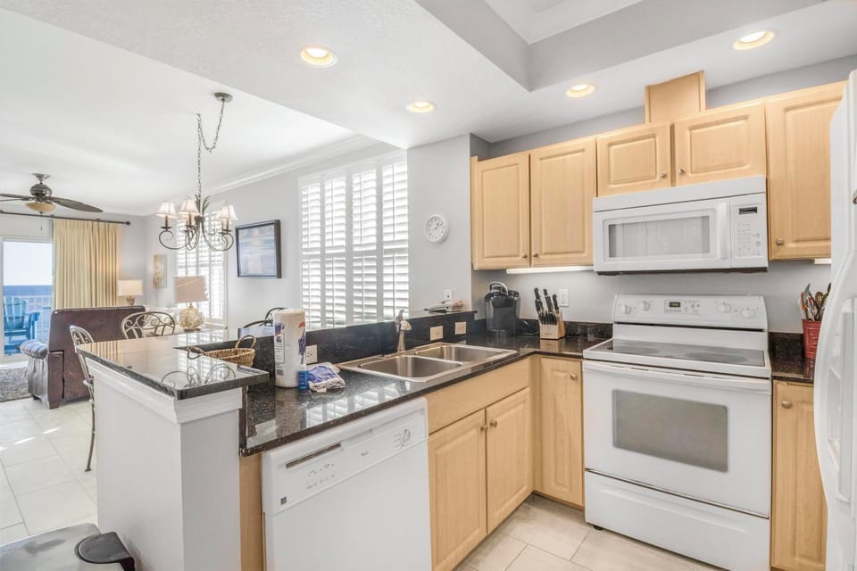 Kitchen is stocked with pots/pans/utensils