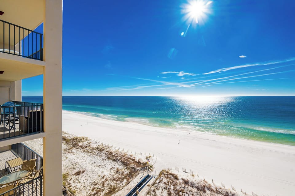 Bask in sunlight on your balcony while enjoying views of the tranquil water and expansive shoreline