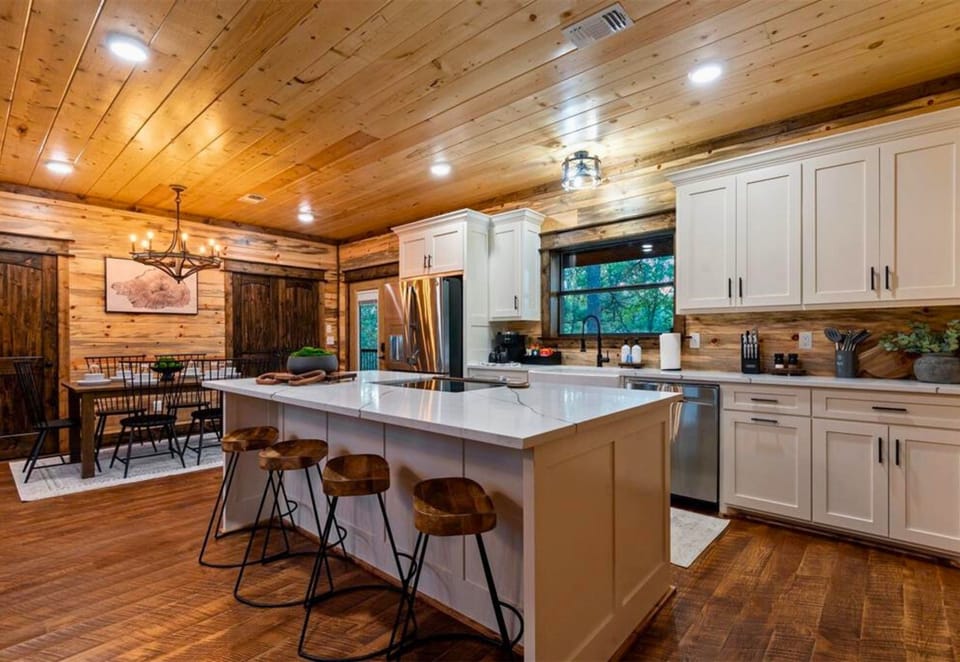 Pull up a barstool at the kitchen island to share laughs, drinks, and stories while dinner comes together.