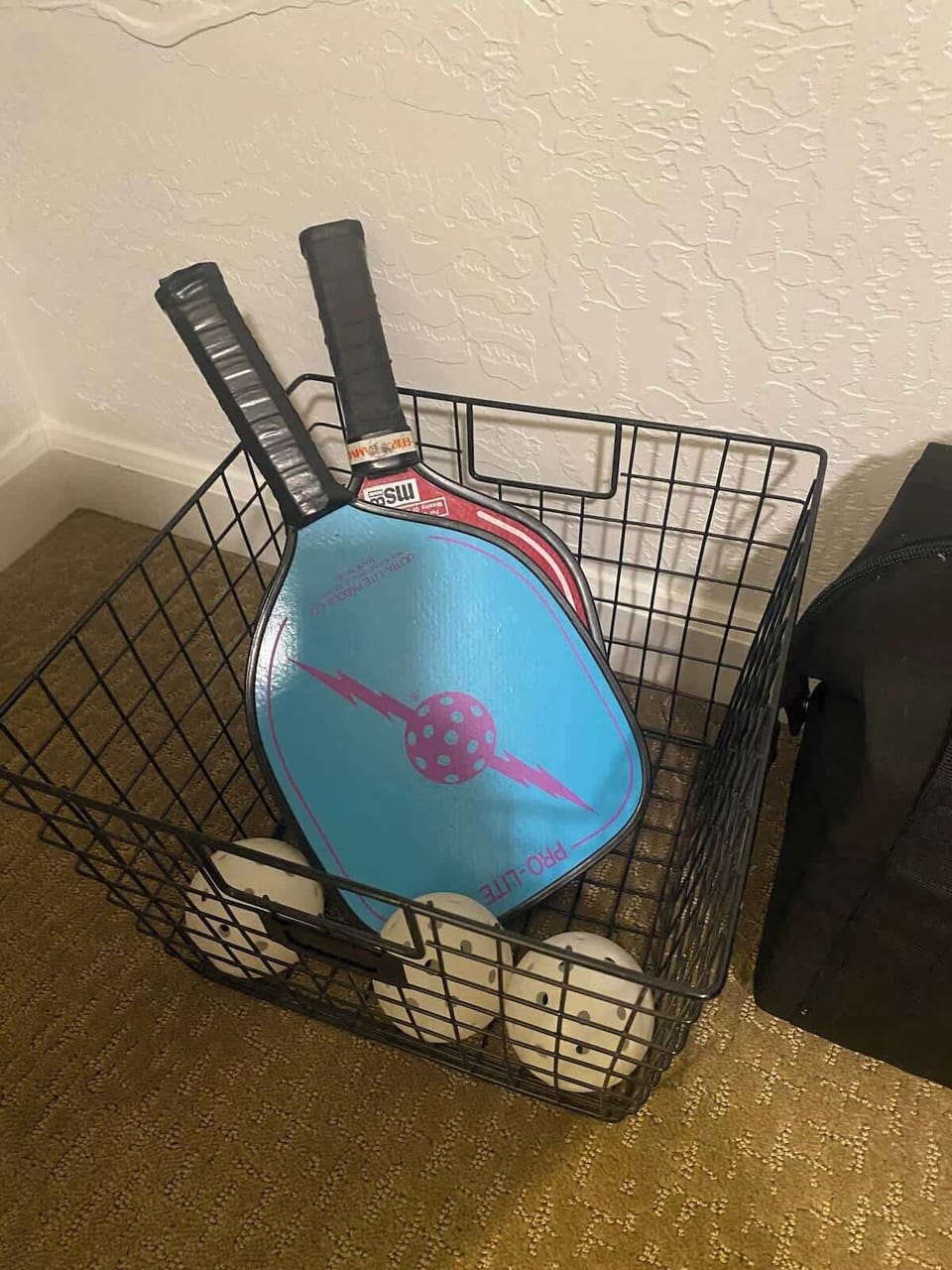 Pickle ball, beach chairs, cooler and other essentials for a fun summer outing. 