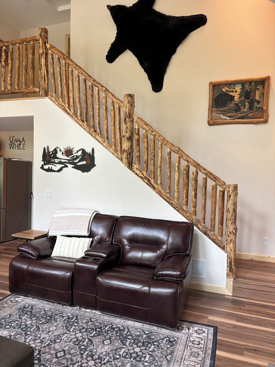 Living room area and log railing