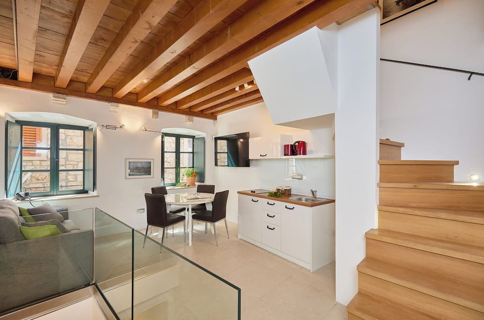 City Apartment, City View | Living area | Flat-screen TV