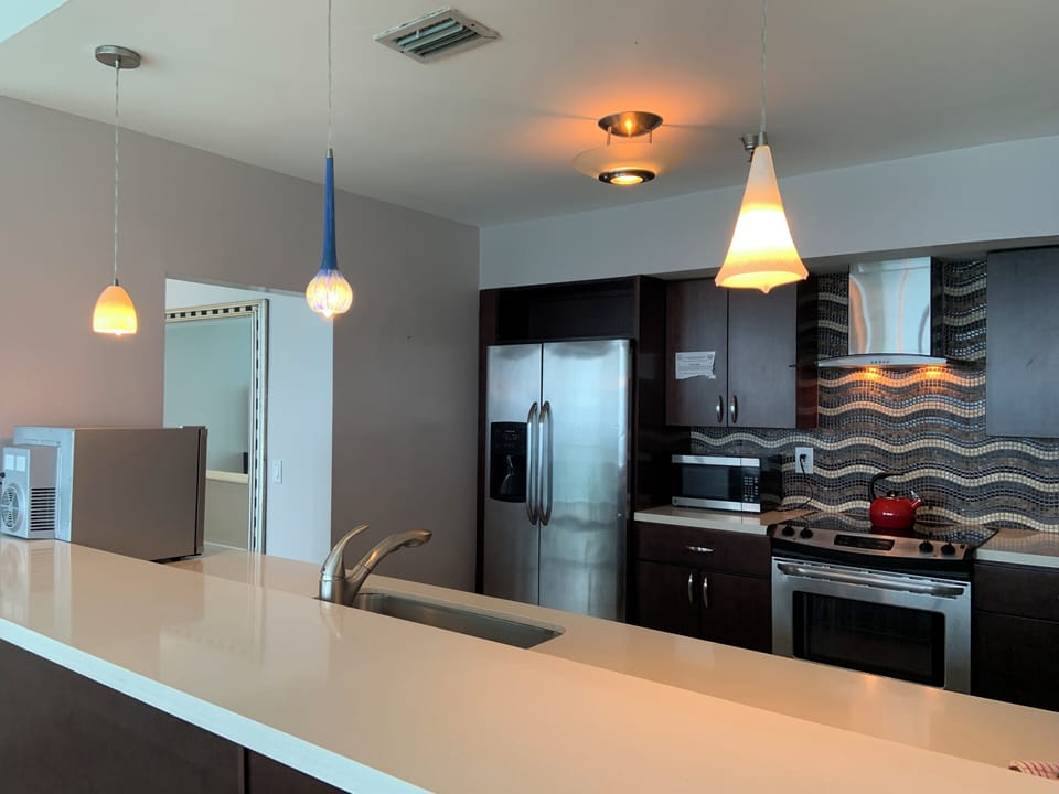 Deluxe Condo | Private kitchen