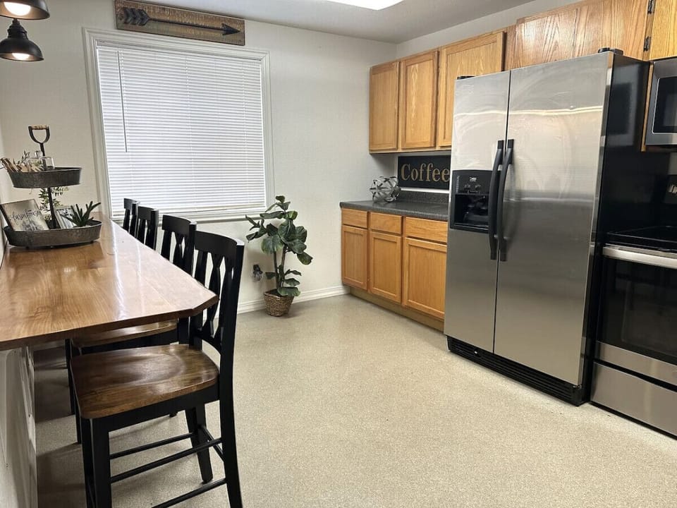 Perfect for family meals or coffee with friends—this kitchen has it all.