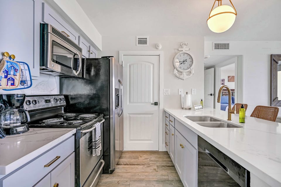 Kitchen with keurig, regular pot coffee, full over, stove, microwave, dishwasher and full size refrigertor and freezer with filtered Ice and water.