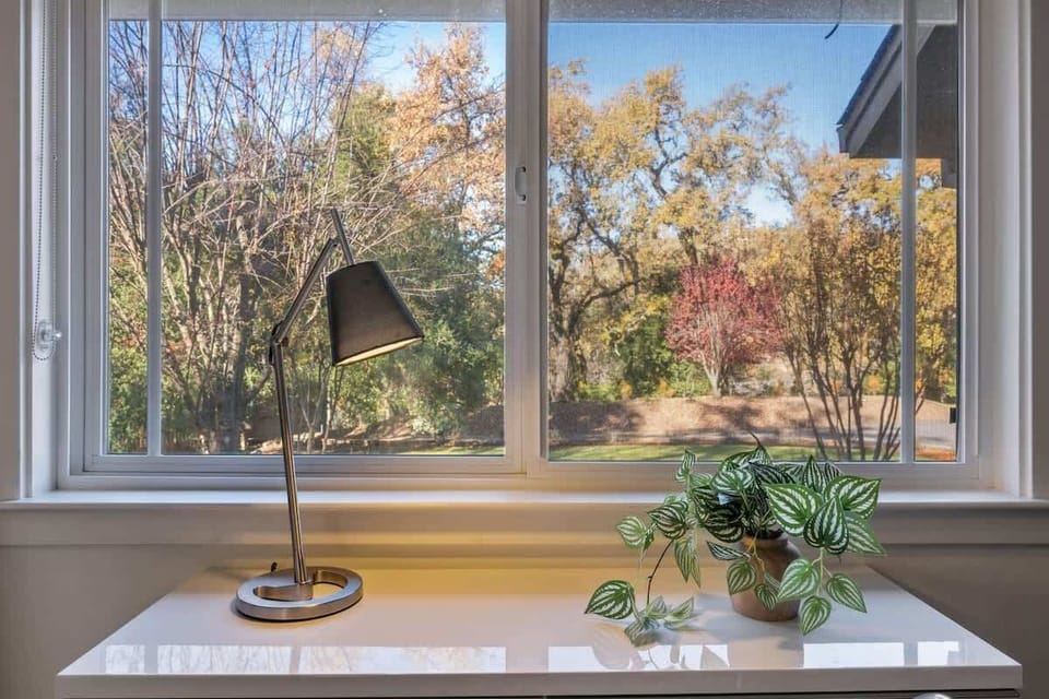 Sunny window nook with beautiful garden views.