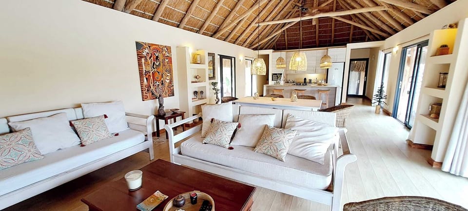 Luxury Villa, 2 Bedrooms, Private Pool, Beach View | Living area | Books