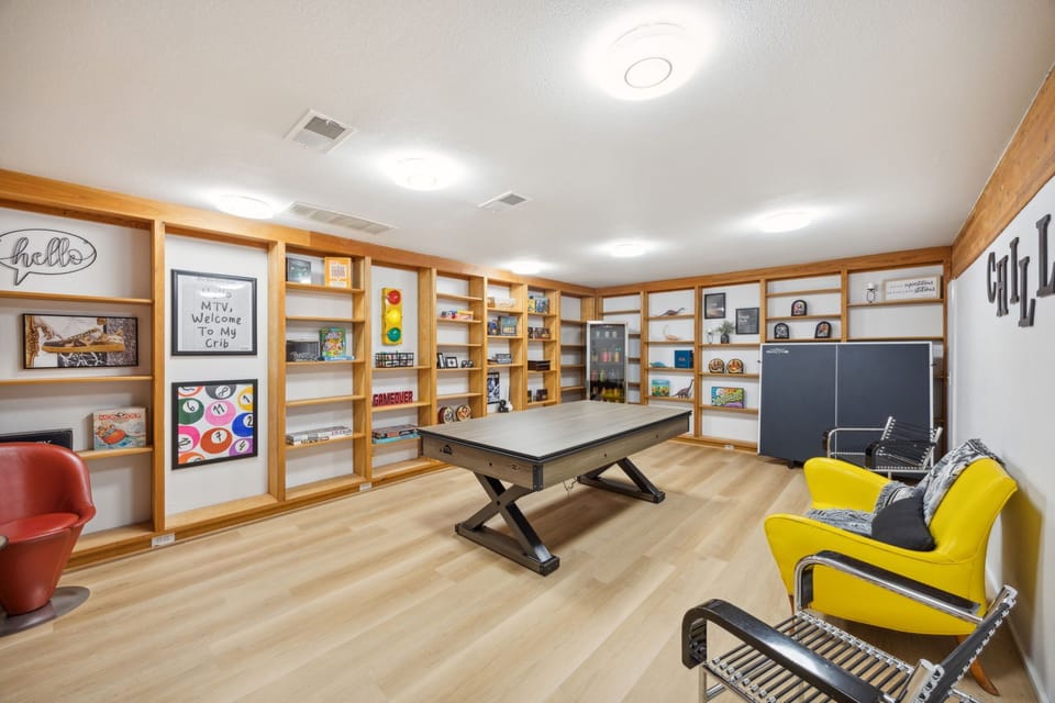 The game room includes a table that converts to air hockey and ping pong.